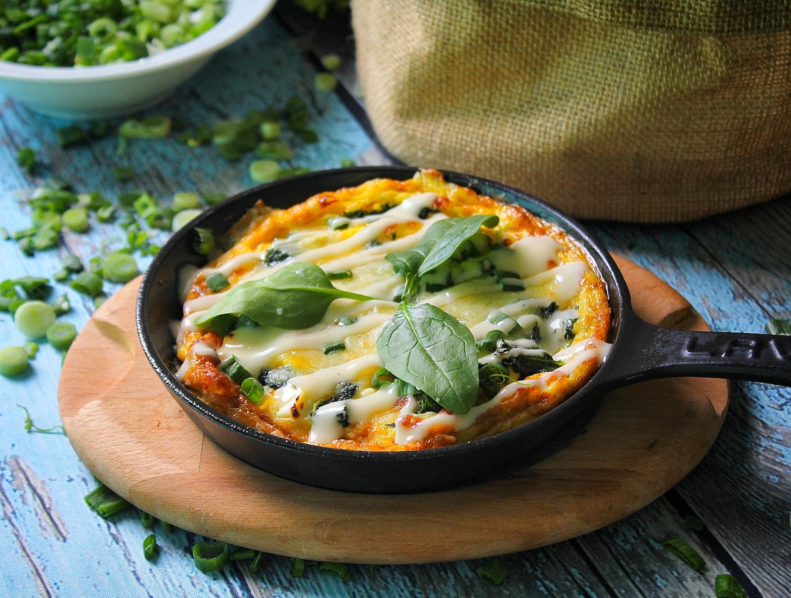 a baked casserole on a cast iron skillet - Kid-Friendly Meals 